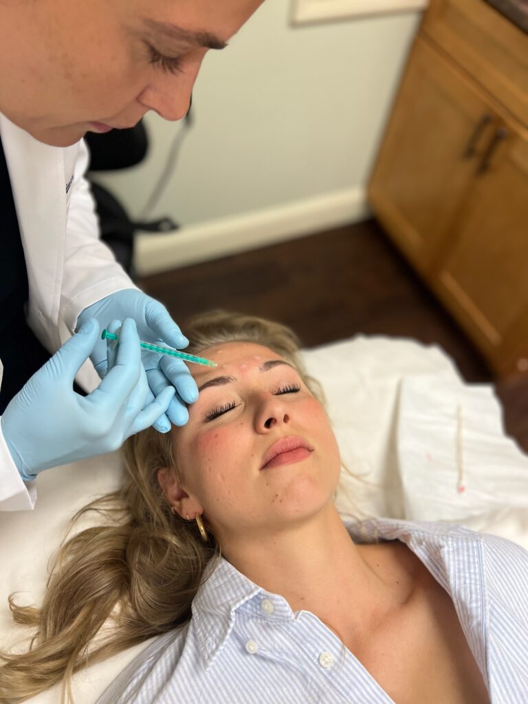 woman being injected with botox