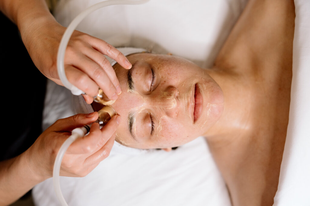 Lymphatic Drainage during a facial session
